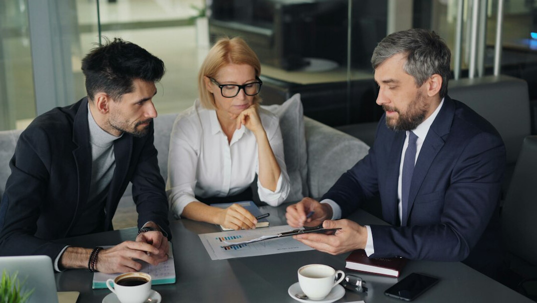 business team negotiating contract