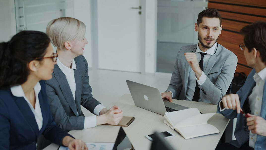 woman leading business meeting